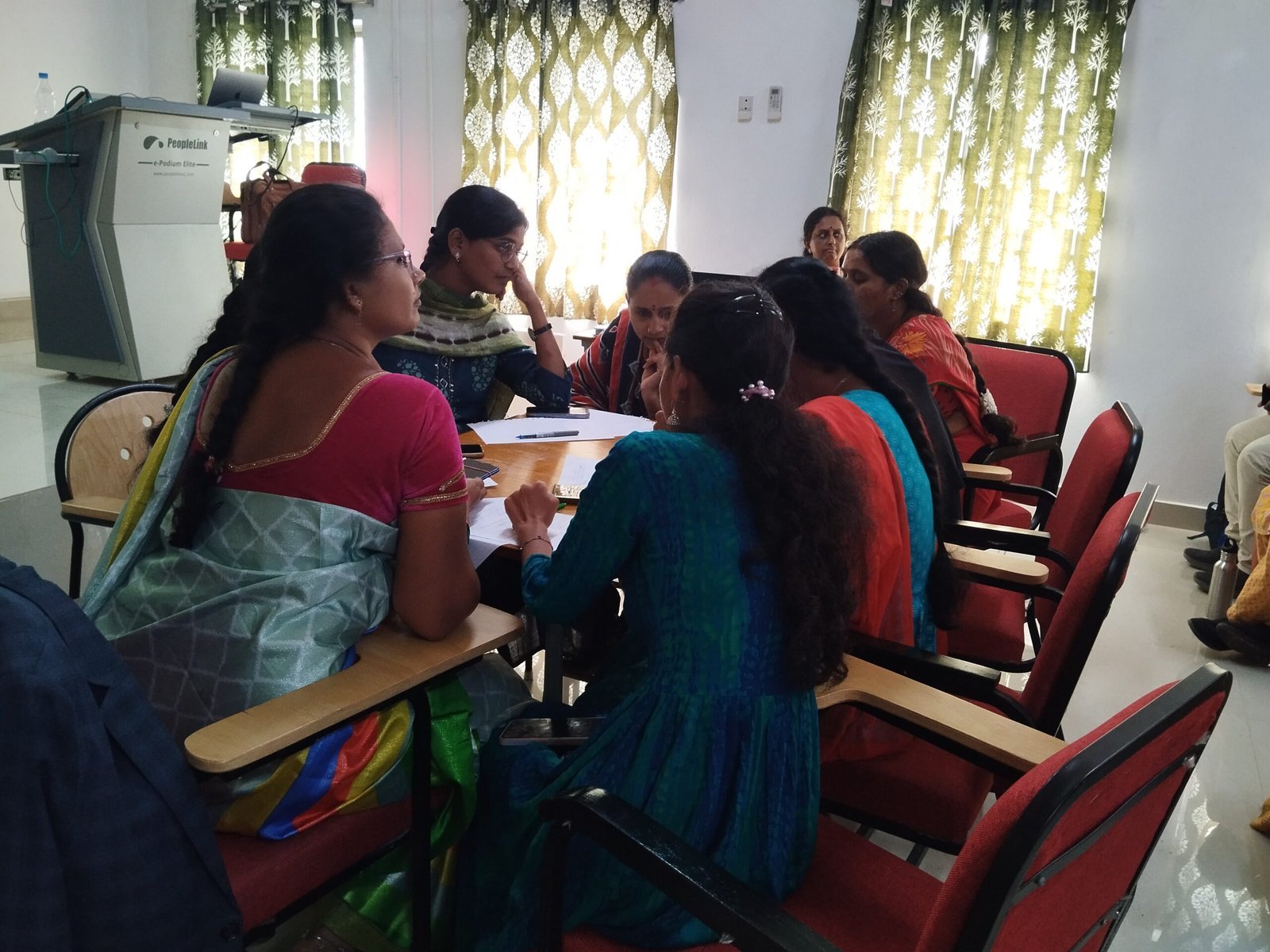 Group Meeting In A Workshop On Skill Development